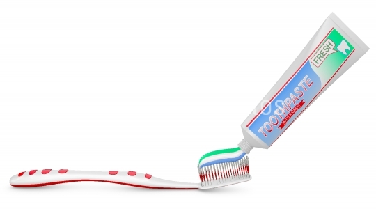 toothbrush and tube of toothpaste