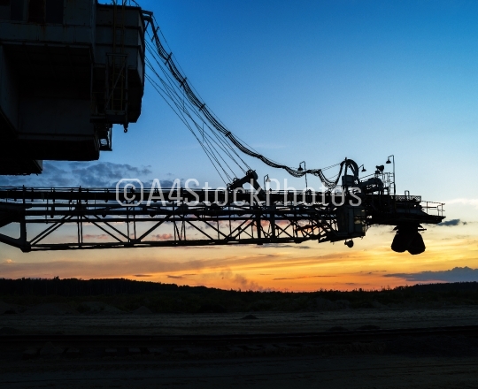 Horizontal vivid industrial sunset machine background backdrop