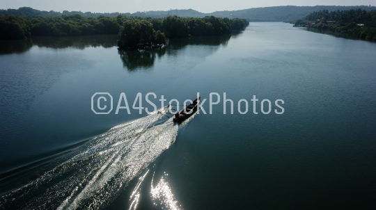 Indian boatman driving lake trace