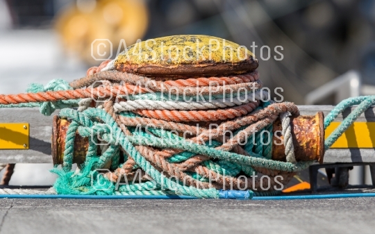 Metal bollard with ropes