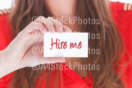 Woman in red showing a business card