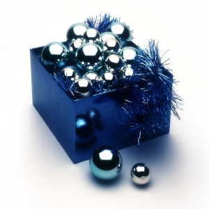 Christmas baubles in a blue box