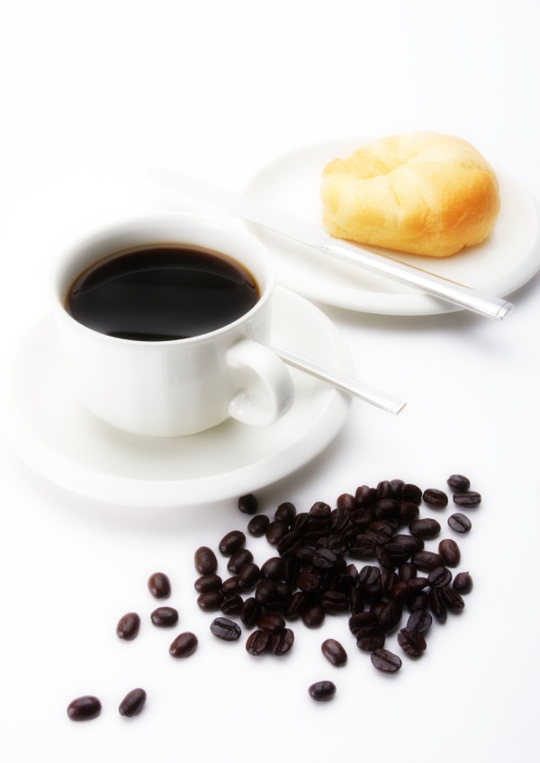 A cup of coffee with doughnut