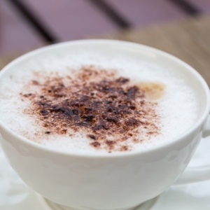 Cappuccino in a cup of coffee.