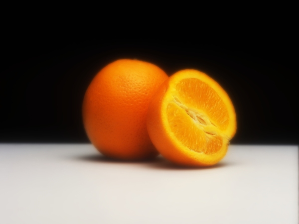 Oranges still life against a dark background