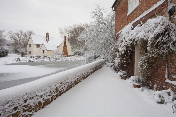 Willy Lott's cottage near Flatford Mill on the River Stour in Suffolk after a heavy snowfall