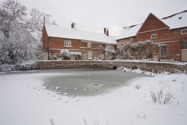 Flatford Mill on the River Stour after a heavy snowfall