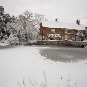 Flatford Mill on the River Stour after a heavy snowfall