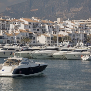 A luxury yacht sailing into the harbour at Puerto Banus, Andalusia on the Costa del Sol in Southern Spain