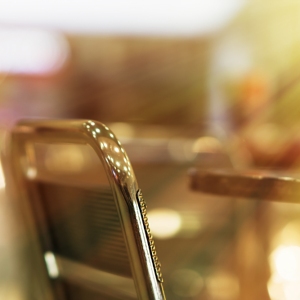 A cafe chair in a blurred cafe background