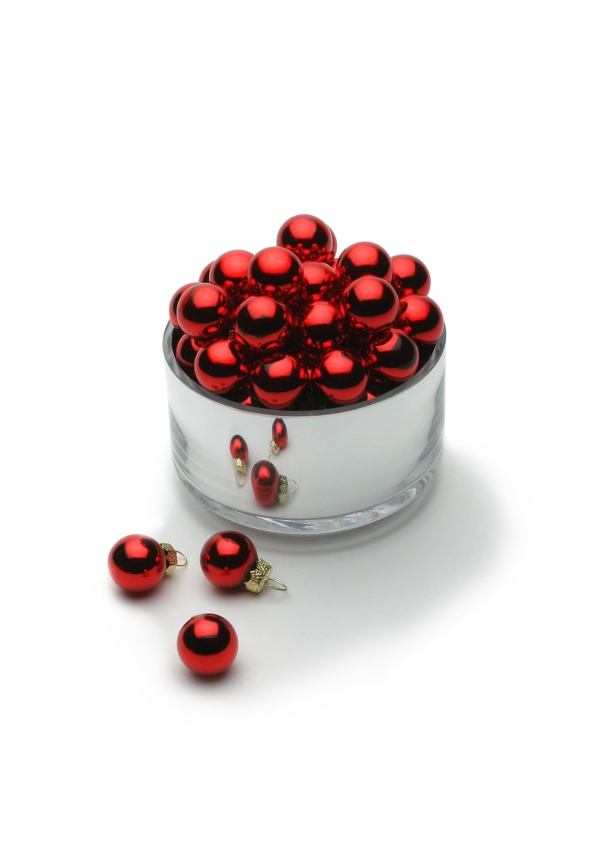 A container with silver Christmas baubles