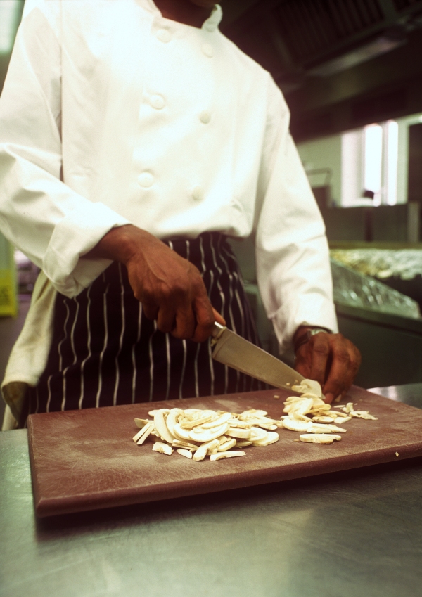 chef, cook, sous chef, chopping board, knife, carving knife, mushrooms, kitchen, restaurant, cafe, catering