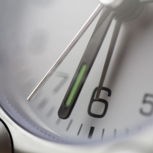 Close up image of a clock face