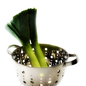 Leeks in a collander