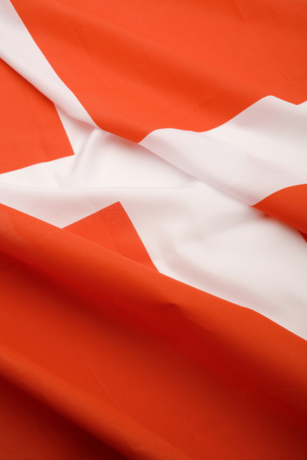 A close up view of a section of the Danish flag