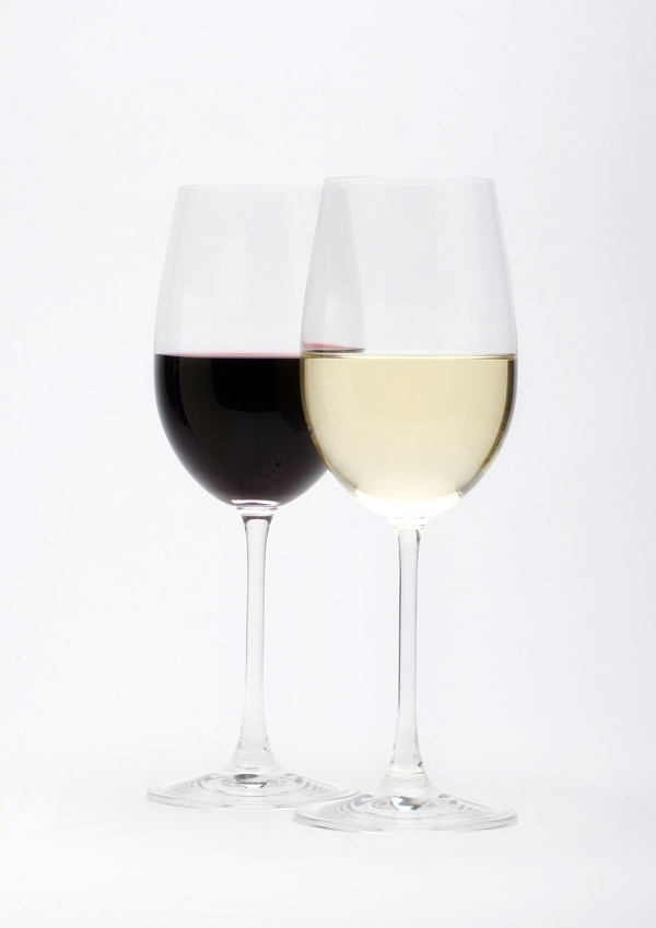 Two wine glasses, one red, one white