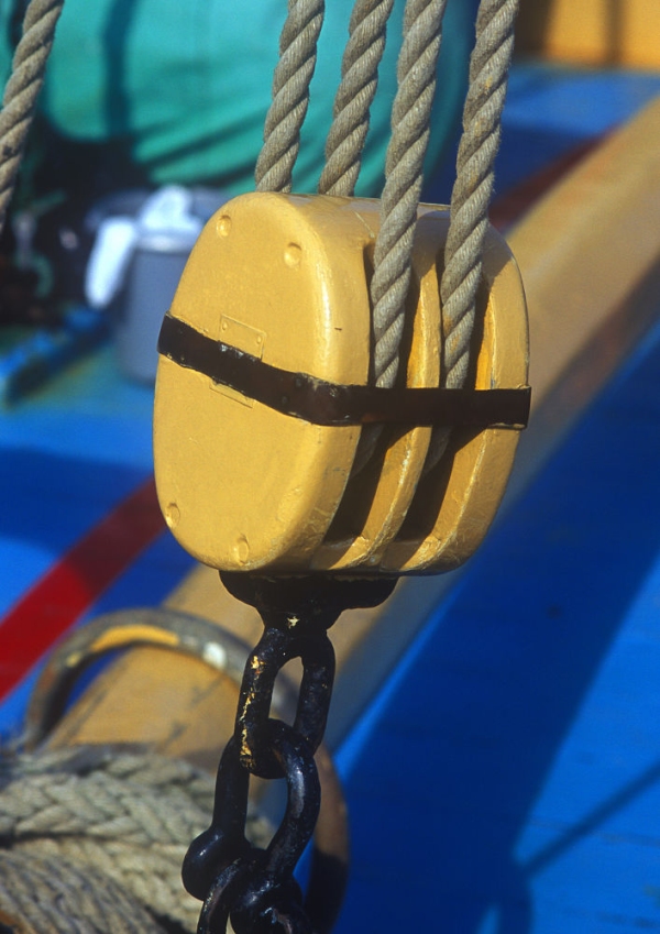 Rope and pulley rigging on the deck of a traditional Thames sailing barge