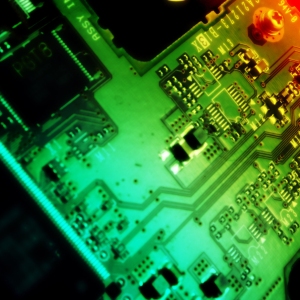 A close up view of a mother board or computer circuit board