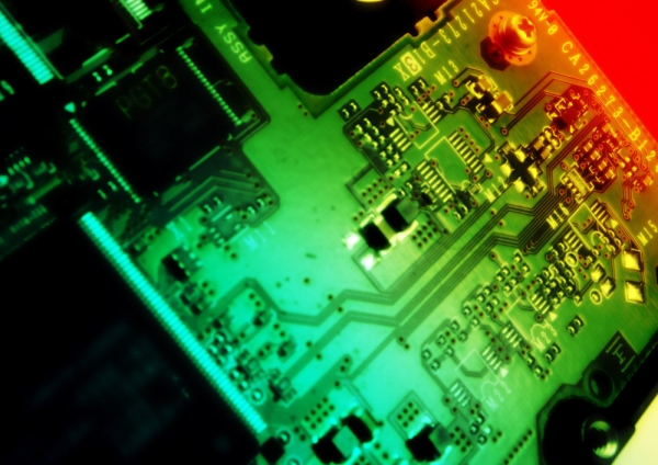 A close up view of a mother board or computer circuit board