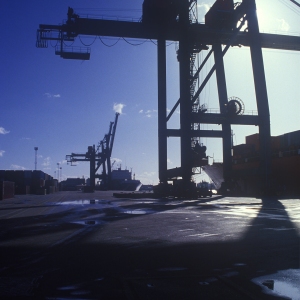 Sun silhouettes at the container port