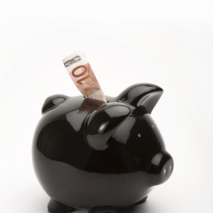 Black piggy bank with Euros