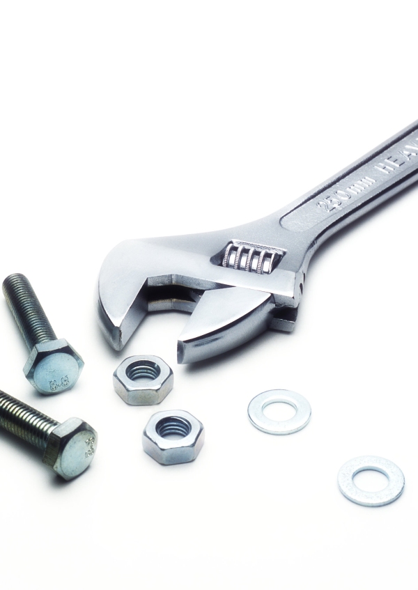 An adjustable spanner with nuts and bolts