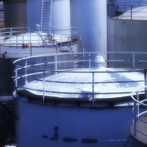 Oil or chemical storage tanks in a tank farm at a container terminal