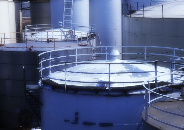 Oil or chemical storage tanks in a tank farm at a container terminal