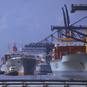 Container ships lined up at the dockside for unloading