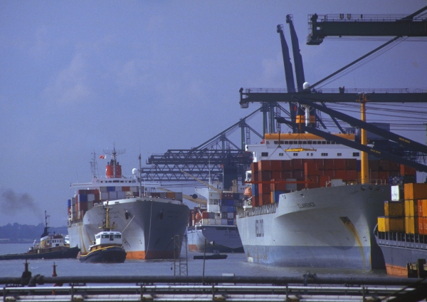 Container ships lined up at the dockside for unloading