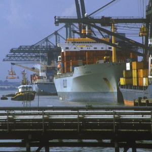 Container ships loading at the terminal