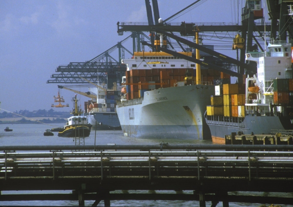 Container ships loading at the terminal