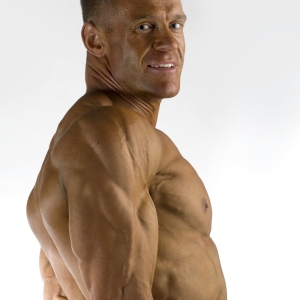 A bodybuilder posing for the camera