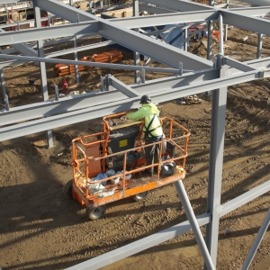 Working on the initial steel frame stage of a large commercial building