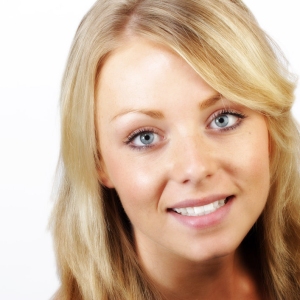 Pretty blonde girl smiling at the camera