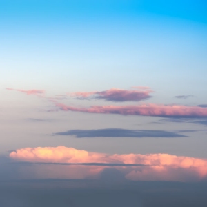 Horizontal dramatic clouds over island landscape background