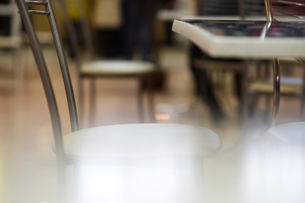 Stylish chairs in a modern cafe with out of focus background