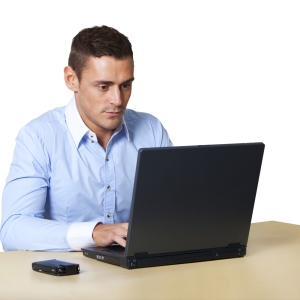 Man working at laptop computer