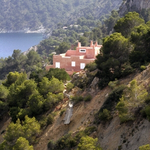 Hilltop villa on a rocky coast in Ibiza