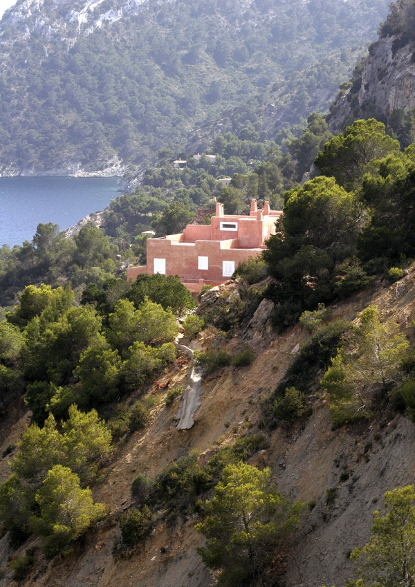 Hilltop villa on a rocky coast in Ibiza