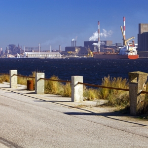 A large industrial dockland area containing a variety of refining and manufacturing plants