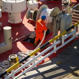 A deckhand on a North Sea ferry arranging anchor ropes