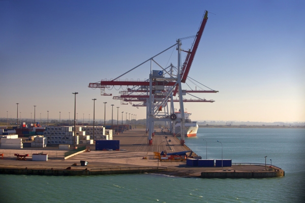 A container ship unloading at a European port