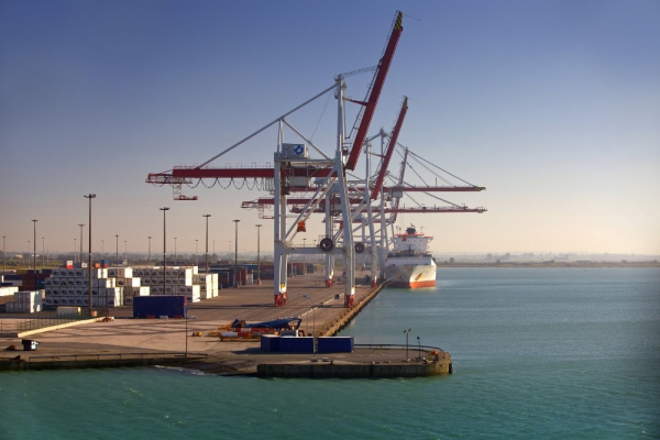 Container ship being unloaded at port