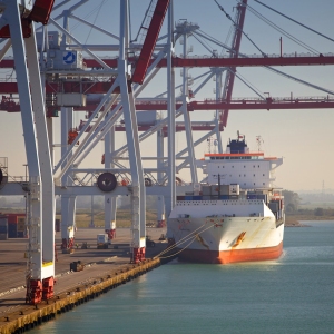 A container ship moored and ready for unloading at a container terminal