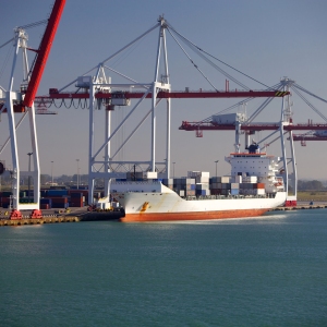 A container ship at the quayside being unloaded