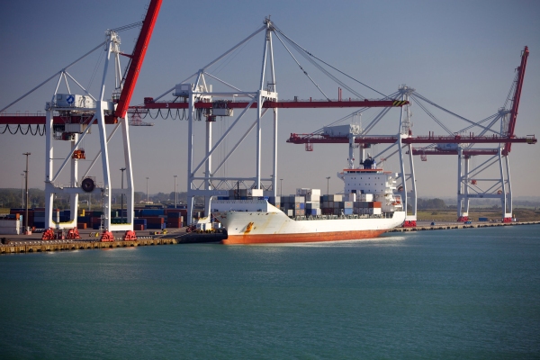 A container ship at the quayside being unloaded