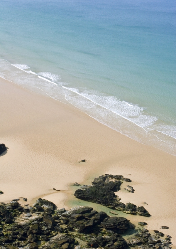 Golden sands and blue sea at Watergate Bay