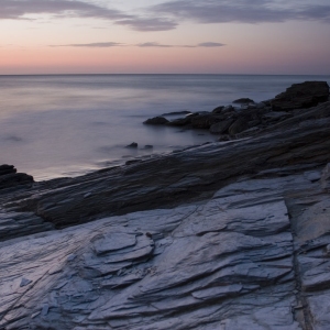 Rock formation at sunset on a Cornish beach