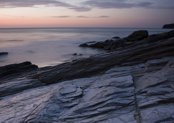 Rock formation at sunset on a Cornish beach